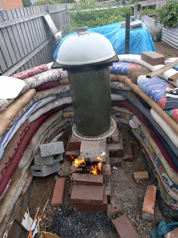 Earthbag wall and cob pizza oven part two. Rocket pizza oven
